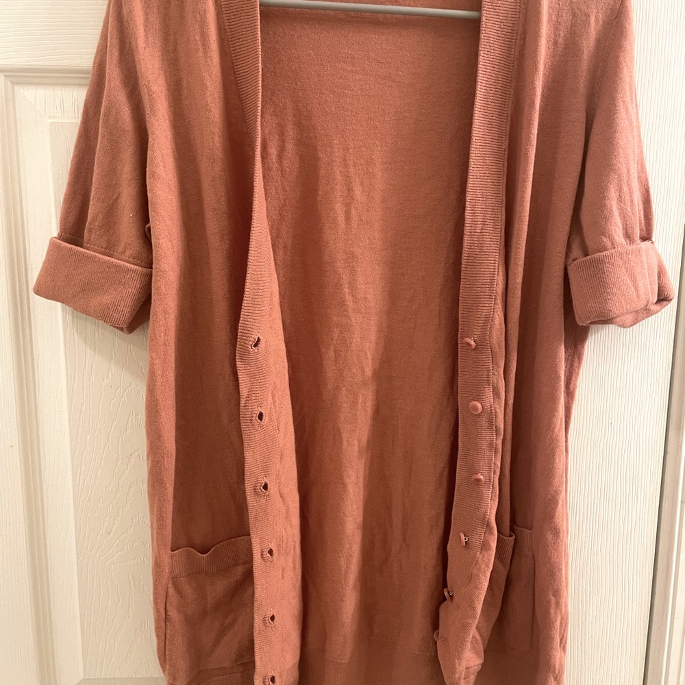 Peach colored cardigan/sweater